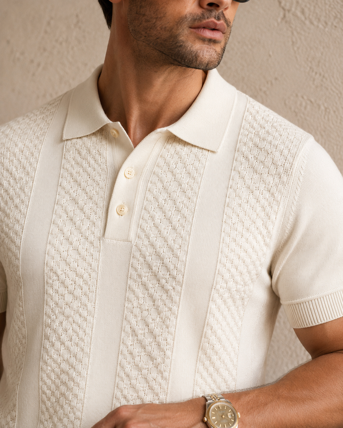 CORD knit polo in cream — collar and placket close-up showing the textured vertical knit panels