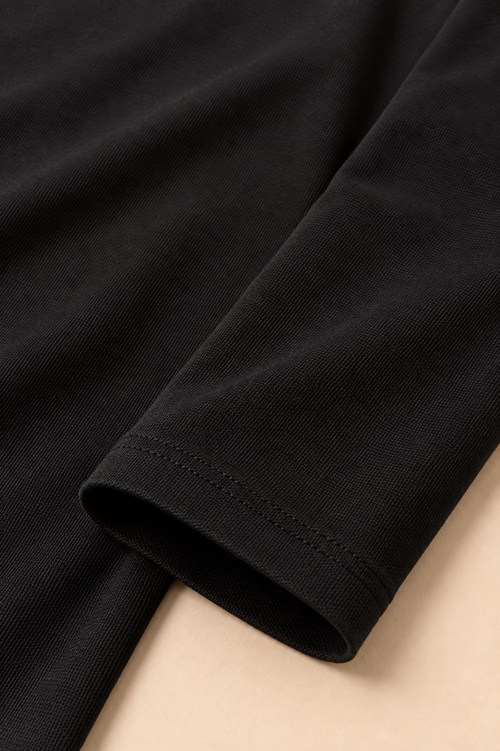 Full Sleeve Oxford Polo in Black — cuff and fabric detail
