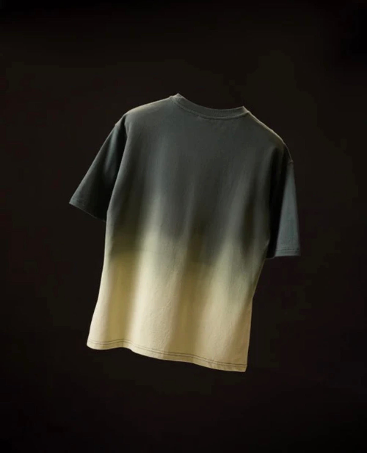 Ombrix tee in olive fading to sage — back of the tee shown on its own, unbroken gradient across it