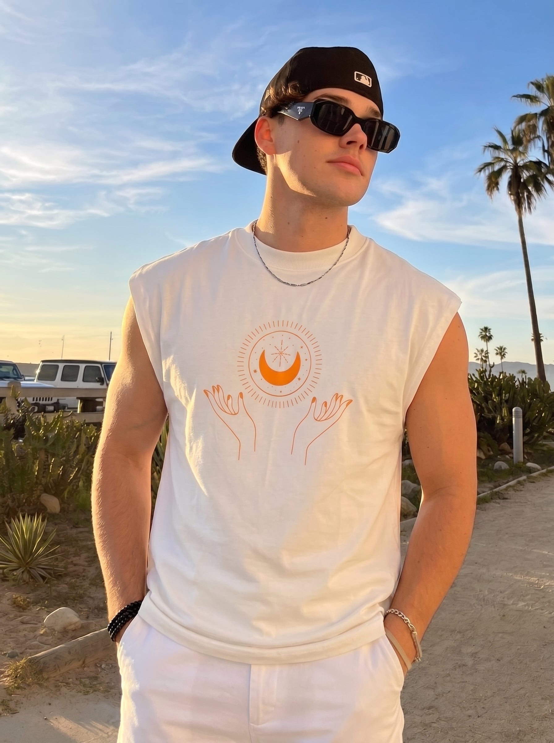 CELESTIAL EMBRACE premium sleeveless tee | 5th Century Collection | front view | THE SUNYA