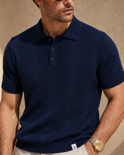 CORD knit polo in navy — close crop of the buttoned placket and textured front panels