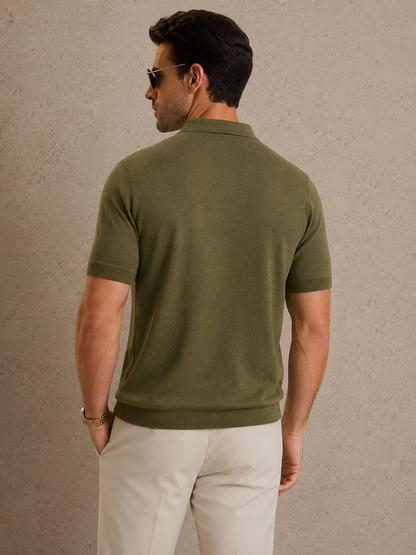CORD knit polo in olive — three-quarter back view on model, one hand in the pocket