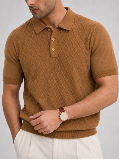 HIVE Knit Polo in camel — torso close-up showing the tonal buttons, ribbed cuffs and raised knit texture