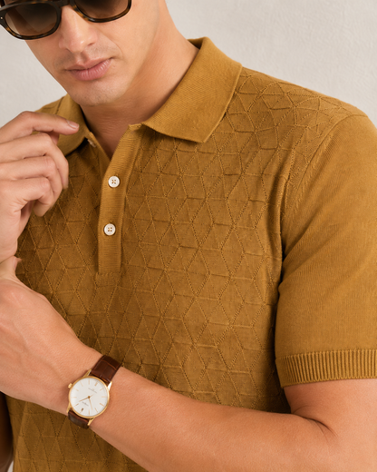 LEAF Knit Polo in camel — close crop on the collar and two placket buttons, knit texture in relief