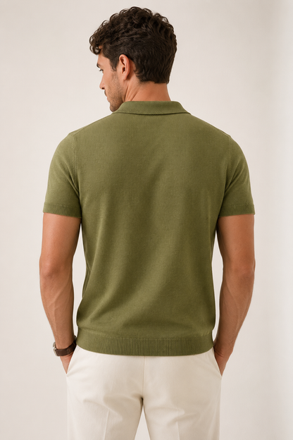 LEAF Knit Polo in olive — back view on model, plain-knit back and ribbed hem, head turned to the side