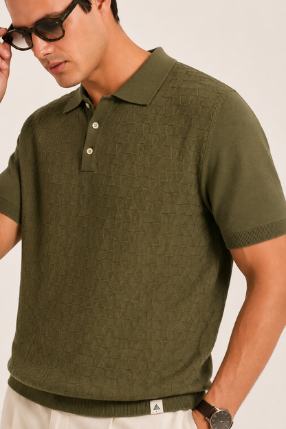 LEAF Knit Polo in olive — angled close-up of the collar and placket buttons above the woven hem tab