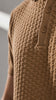 TILE Knit Polo in Camel — raised brick-texture cotton knit with polo collar, shown in motion