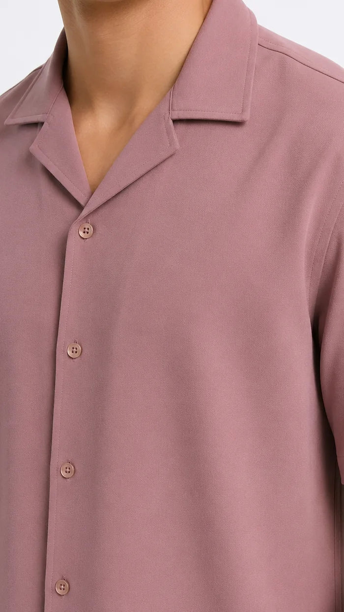 Close-up of the GULABI dusty rose camp collar and tonal buttons