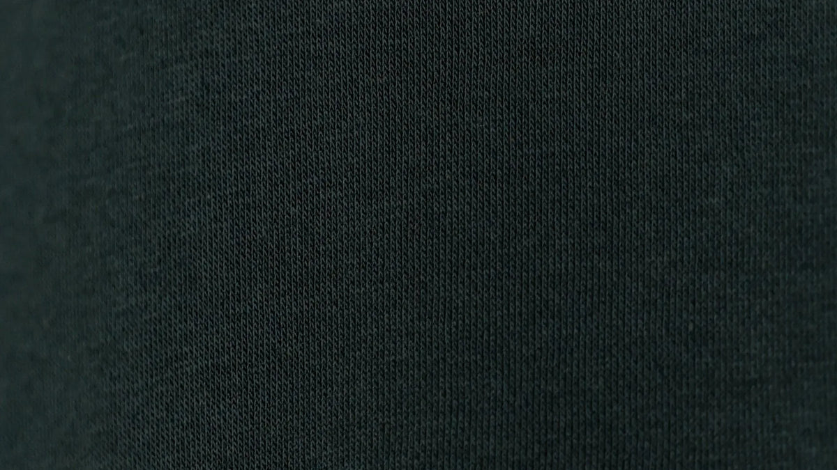 The forest-green 350 GSM cotton fleece of the NEXUS hoodie