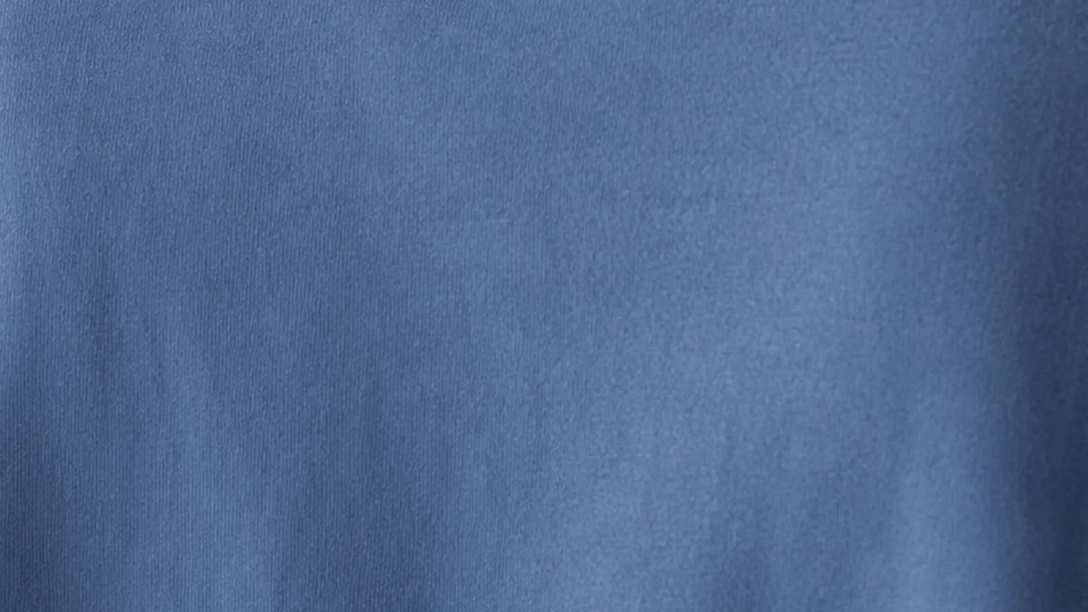 Edge-to-edge close-up of royal-blue cotton terry lycra knit