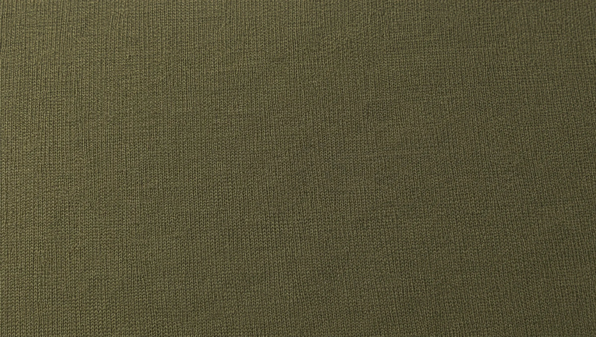 Edge-to-edge close-up of olive-green French Terry cotton